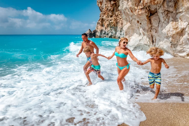 A familiy at a beach in their holidays